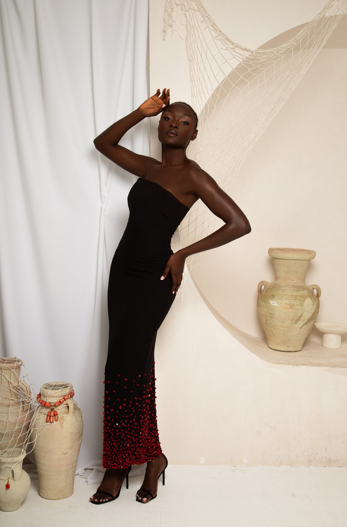 Twin By Tare Isaac black evening dress editorial shot